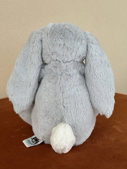 Peluche coniglietto Jellycat Medium Bashful Shimmer grigio chiaro con stelle argento coniglio-